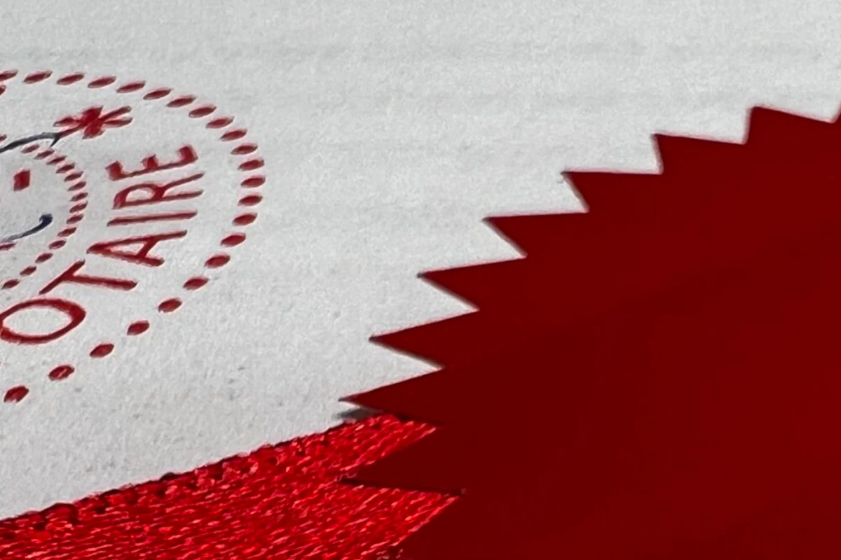 Close-up of the embossed notarial stamp pressed into the paper